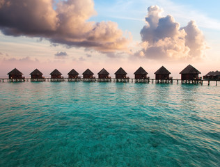 Maldives. houses on piles on water