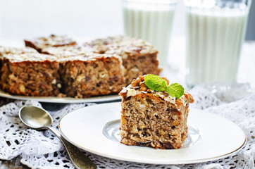 Fototapeta na wymiar oatmeal cake with dates and walnuts