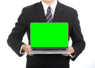 Businessman hold computor laptop for show green screen VDO
