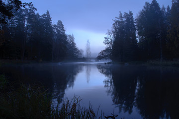 View of a river in the blue time before the sunrise