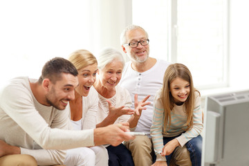 happy family watching tv at home