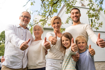 happy family in front of house outdoors