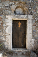 Fototapeta na wymiar Door from church at ancient Pyli, Kos; Greece