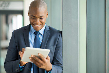 african american entrepreneur using tablet computer