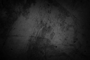 Rough dark black grunge concrete texture wall background