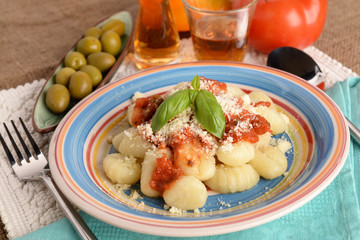 GNOCCHI AL SUGO E OLIVA - DUMPLINGS AND OLIVE SAUCE