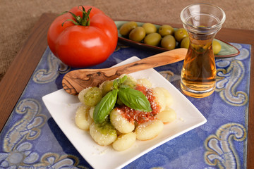 GNOCCHI AL SUGO E OLIVA - DUMPLINGS AND OLIVE SAUCE
