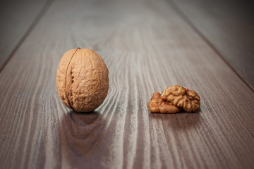 walnuts on the brown wooden table