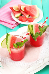 Watermelon cocktail on table, close-up