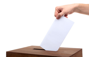 Obraz premium Human hand inserting envelope in mailbox isolated on white