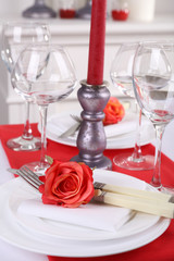 Festive table setting on room background