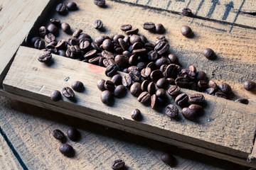 coffee beans on wooden background