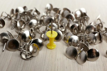 Individuality concept. Pushpins close-up