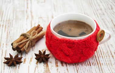 Cup with knitted thing