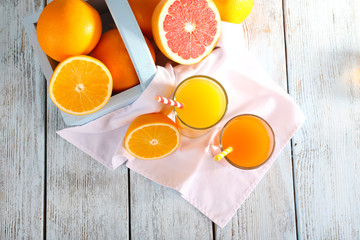 Orange and carrot juice in glasses