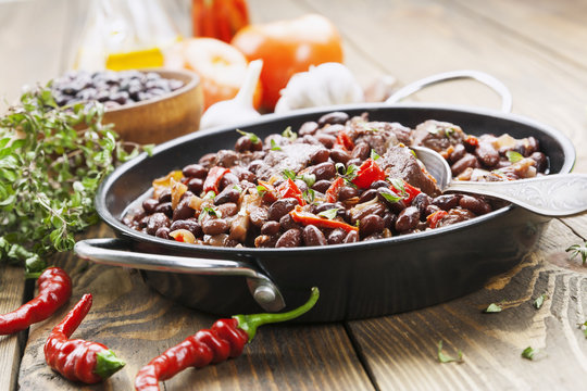 Meat stew with red beans and chili