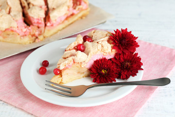 Piece of tasty pie with apples and berry mousse,
