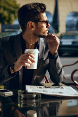 Businessman reading a newspaper