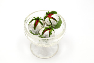 Green color Indian sweet dish Anarkali in a bowl