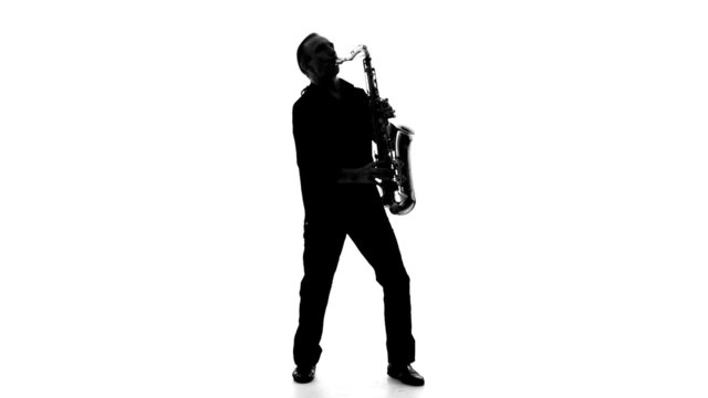 Silhouette of a man playing the saxophone on a white background