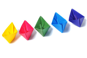 Fototapeta na wymiar Close up origami ship over white