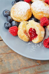 Traditional danish pancakes - ebelskivers with fresh berries