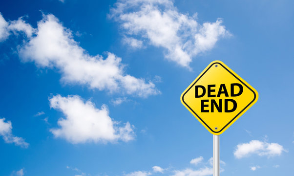 dead end sign on blue sky background