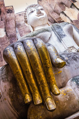 Golden fingers of Buddha Statue in Wat Sri Chum Temple