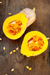 pumpkins cut closeup, on wooden background