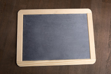 Writing tablet on a brown background