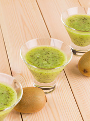 Kiwi juice on the wood