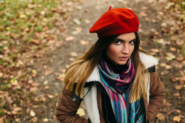 Beautiful young women with a red beret