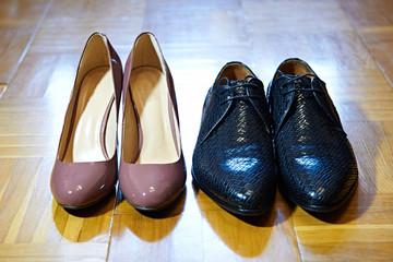 Black male and brown female shoes