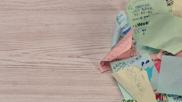 Office desk covered by post it papers - timelapse HD