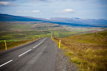 Highway through Icelandic landscape