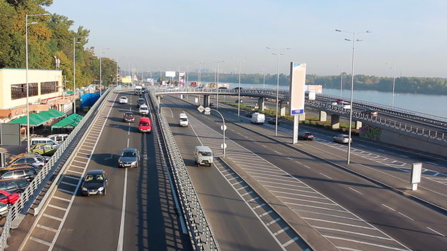 car traffic through overpass at sunny day, Kiev, Ukraine