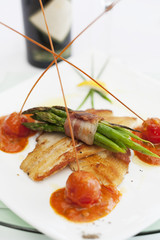 Fillet of fish served on a plate in a restaurant