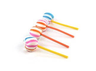 Colorful candies on white background