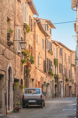 Small car on the streets in the Italian town in Tuscany - 72313852