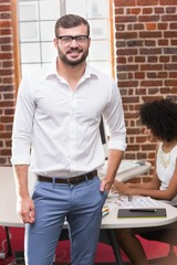 Smiling businessman in office