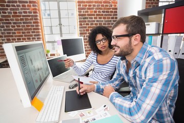 Photo editors using digitizer in office