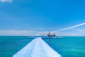 Obraz premium Jetty to the blue Living is Easy
