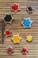 Christmas Cookies stars on wooden table