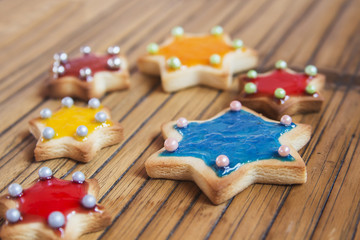 Christmas Cookies stars on wooden table