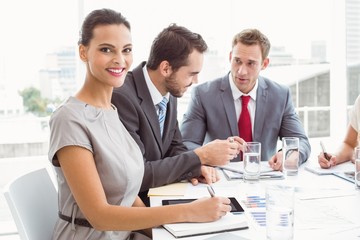Young business people in board room meeting