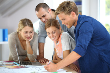Group of students working on construction project