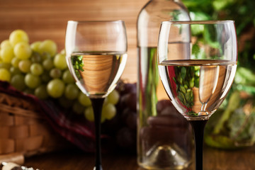 Bottle and glasses of white wine