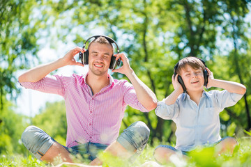 Obraz premium Father and son in park