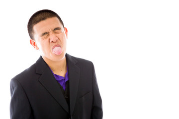 model isolated on plain background face sticking tongue out