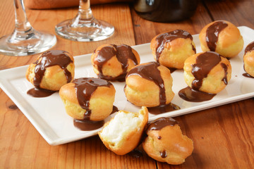Cream puffs with chocolate sauce